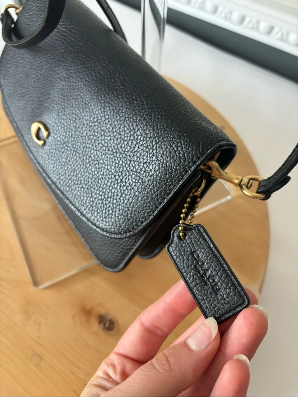 Coach compact pebbled